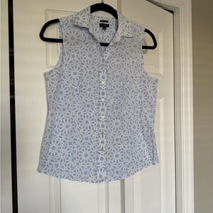 Talbots sleeveless blouse. Light blue button front.